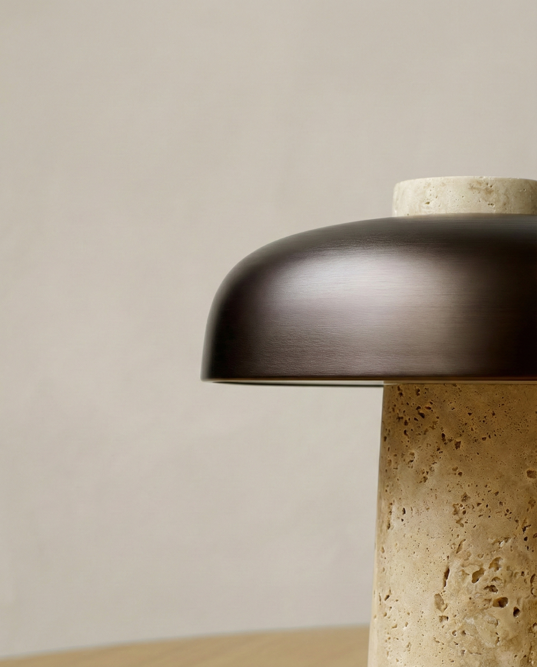 SAGAR designer table lamp casting warm ambient light over a coffee table — DecoHarmonie