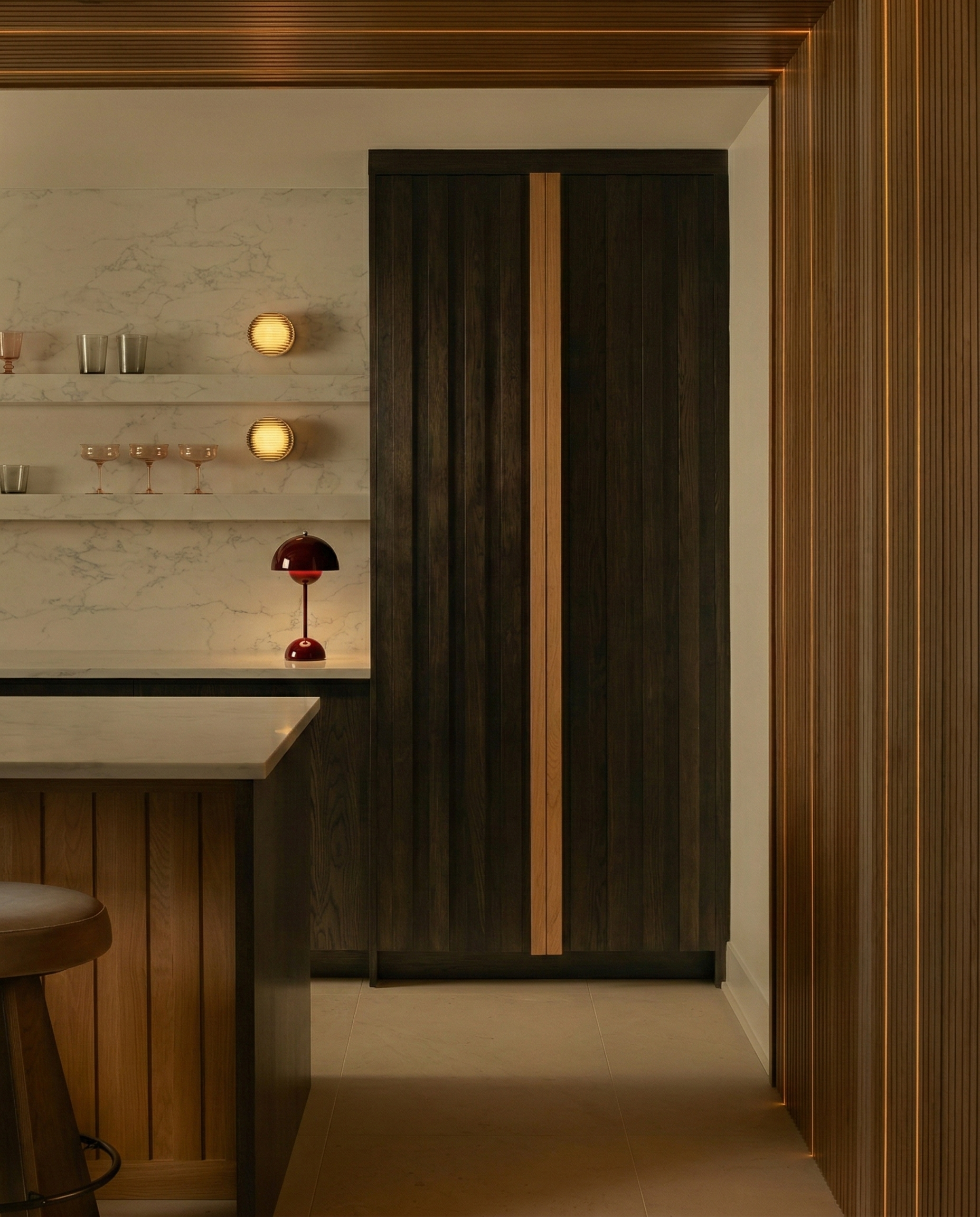 ODEN cordless designer table lamp casting warm ambient light over a coffee table — DecoHarmonie