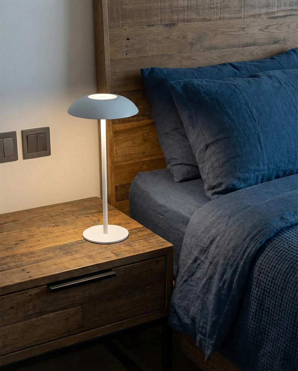 OSLO cordless designer table lamp softening the light in a contemporary lounge — DecoHarmonie