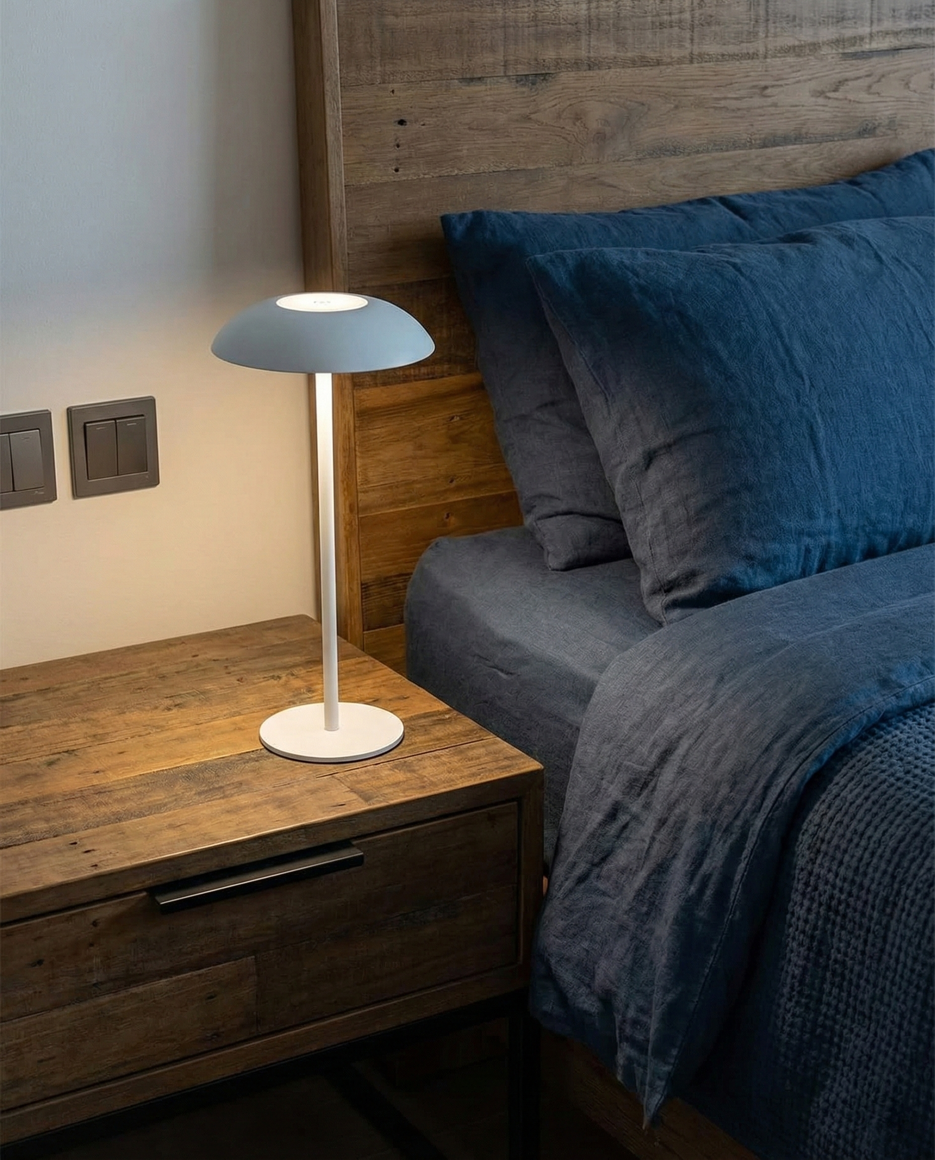 OSLO cordless designer table lamp softening the light in a contemporary lounge — DecoHarmonie